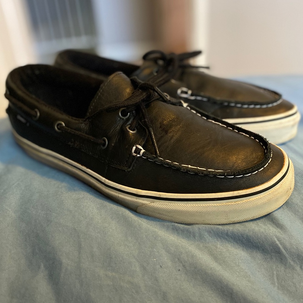 Vans men’s boat shoes size 10.5 black in color